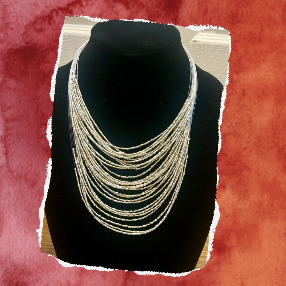 Elegant Multi-Strand Gold and Silver Necklace